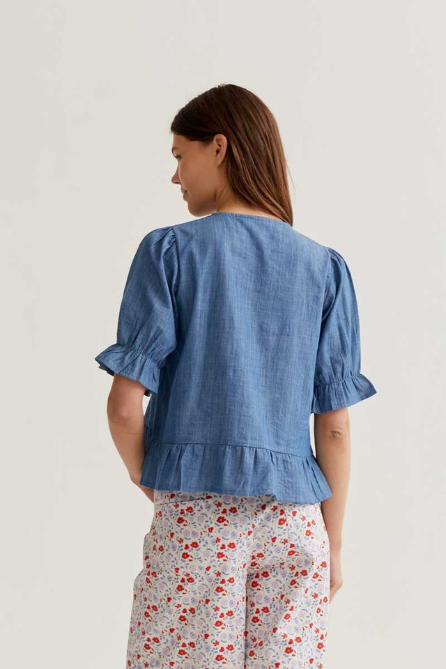 Light blue chambray 100% cotton shirt.