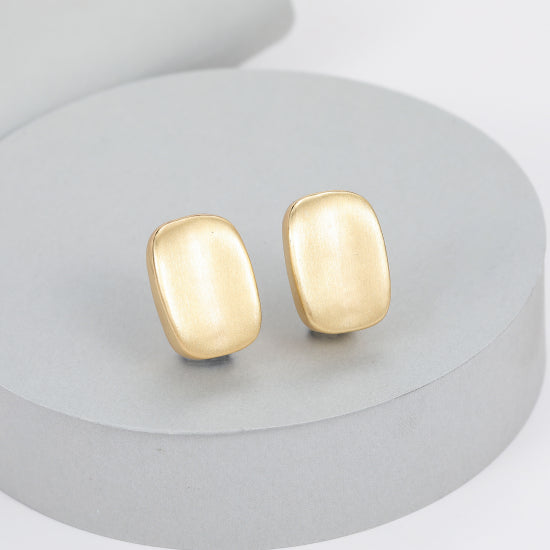 Lucy Clip On Earrings in Matt Gold
