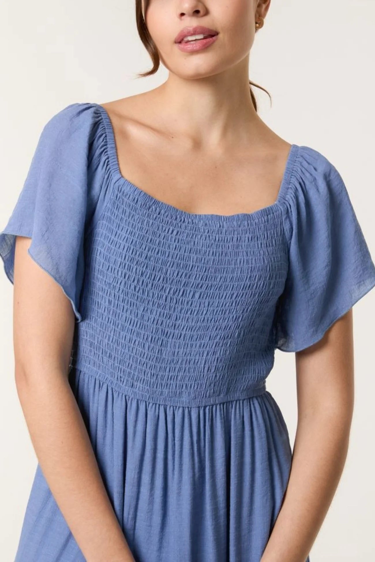 Tiered Dress with Shirring and Flutter Sleeve in Denim Blue