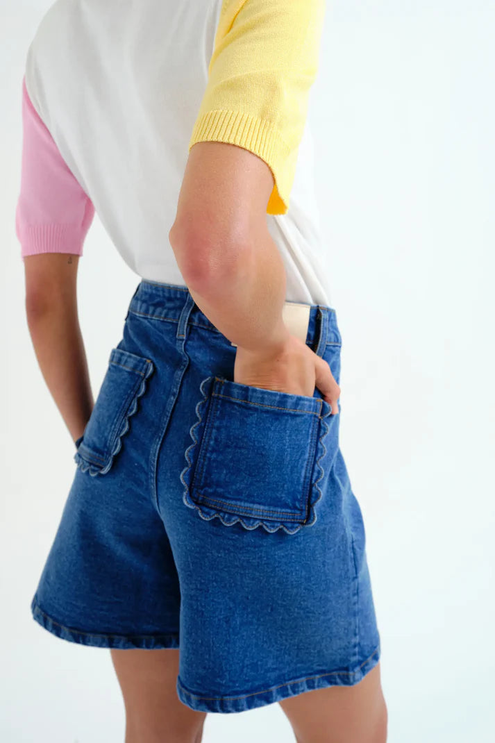 Blue denim shorts with wavy detail