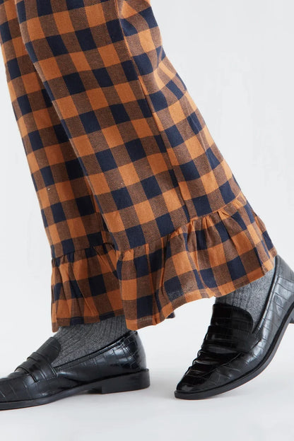100% cotton pants with a brown and navy plaid pattern