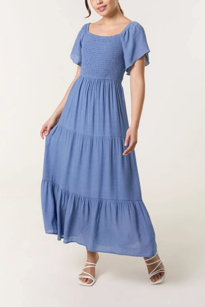 Tiered Dress with Shirring and Flutter Sleeve in Denim Blue