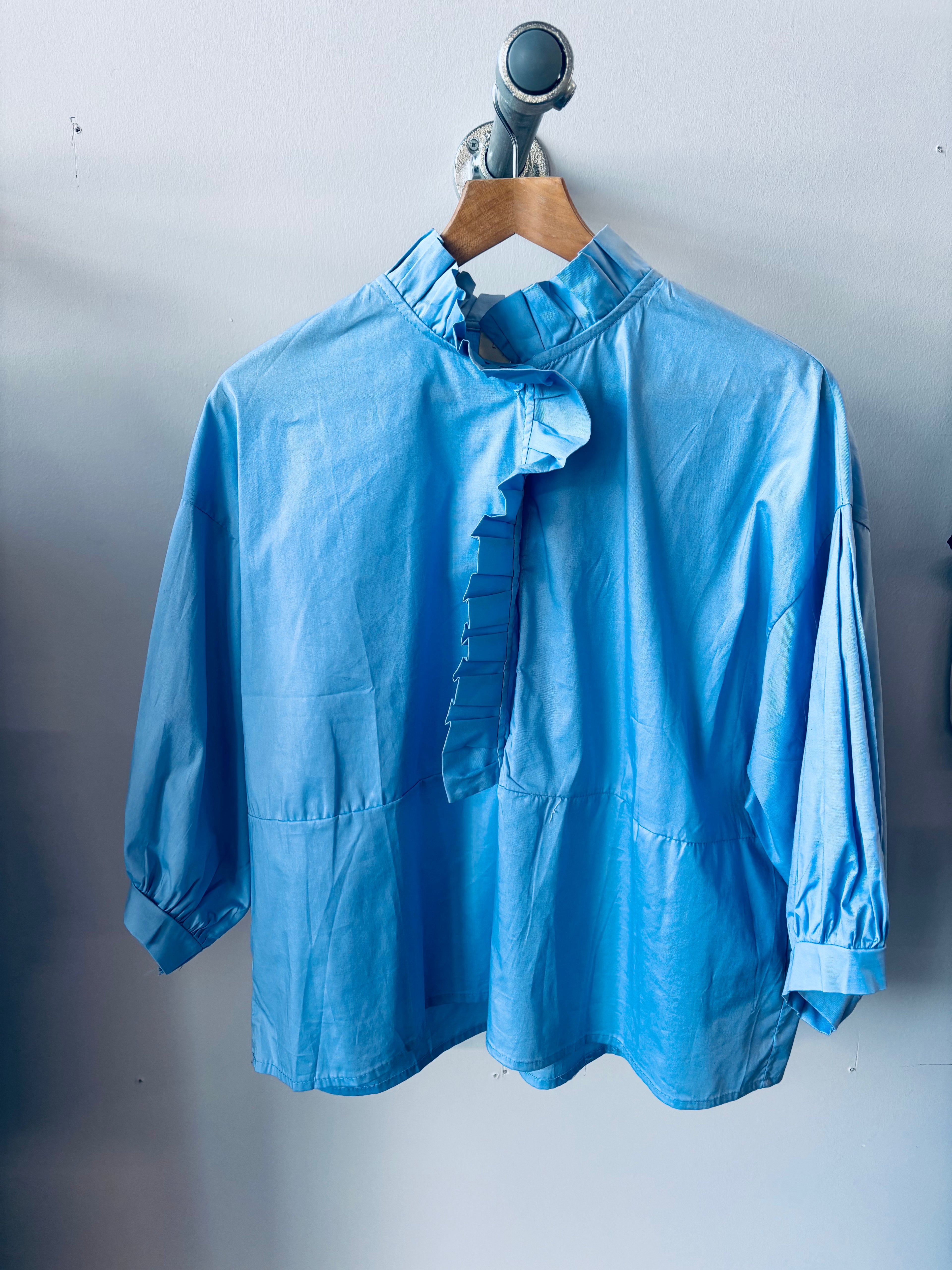 Blue Ruffle shirt (one size)
